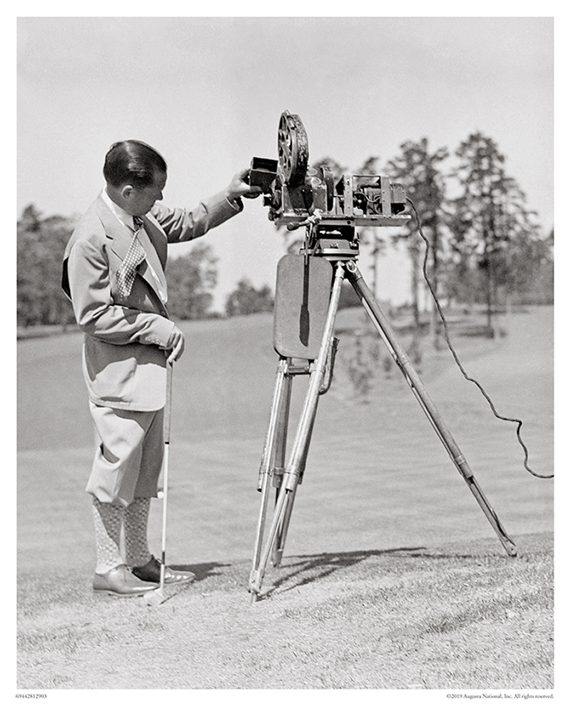 Bobby Jones Inspects Movie Camera, 1930s